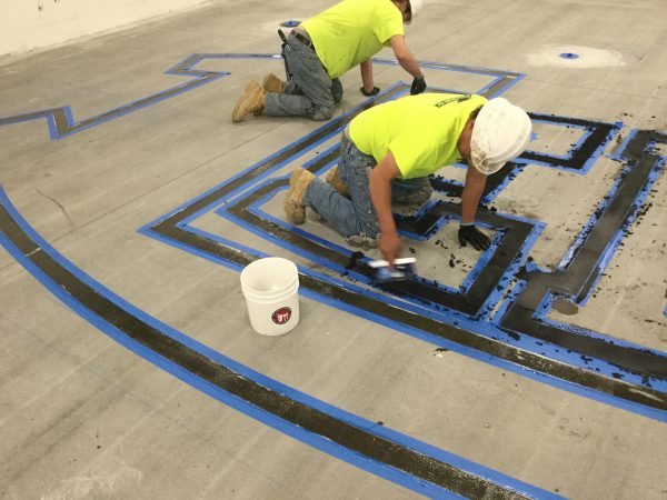 The Many Uses of Epoxy: Using PlexiQuartz to Make a Flooring Logo ...